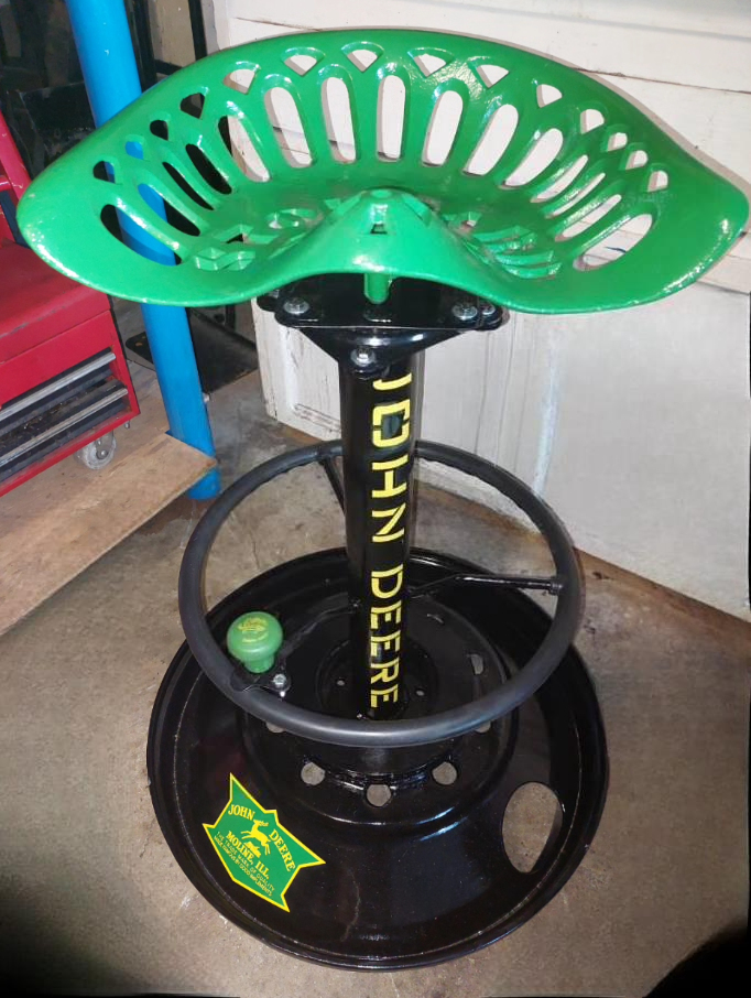 John Deere Tractor Seat Stool. Tractor steering wheel for foot rest.